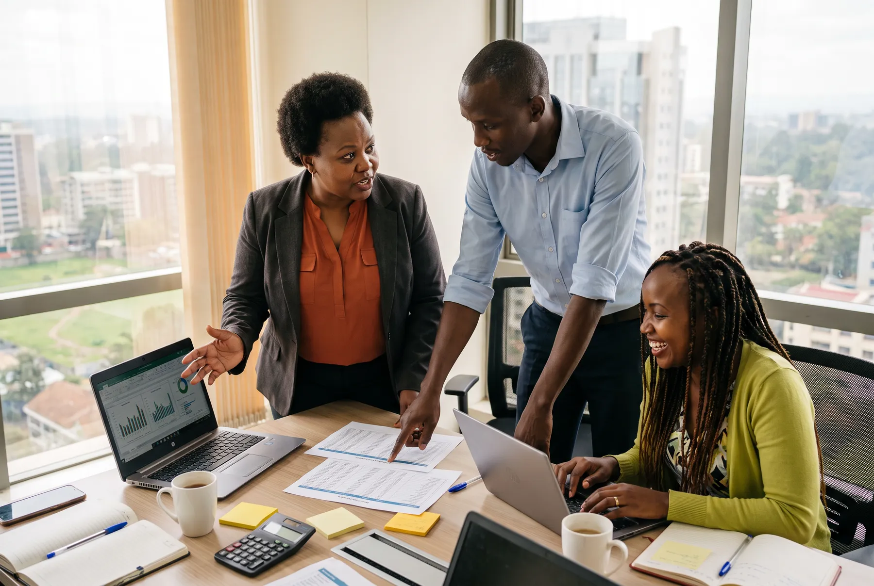 A Kenyan finance team works through month-end figures in a Nairobi office